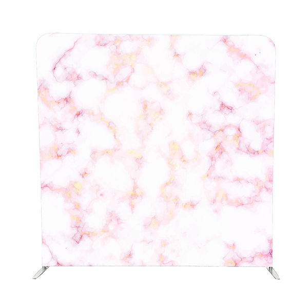 Pink, gold, and white marble pillow stretch backdrop on a metal stand