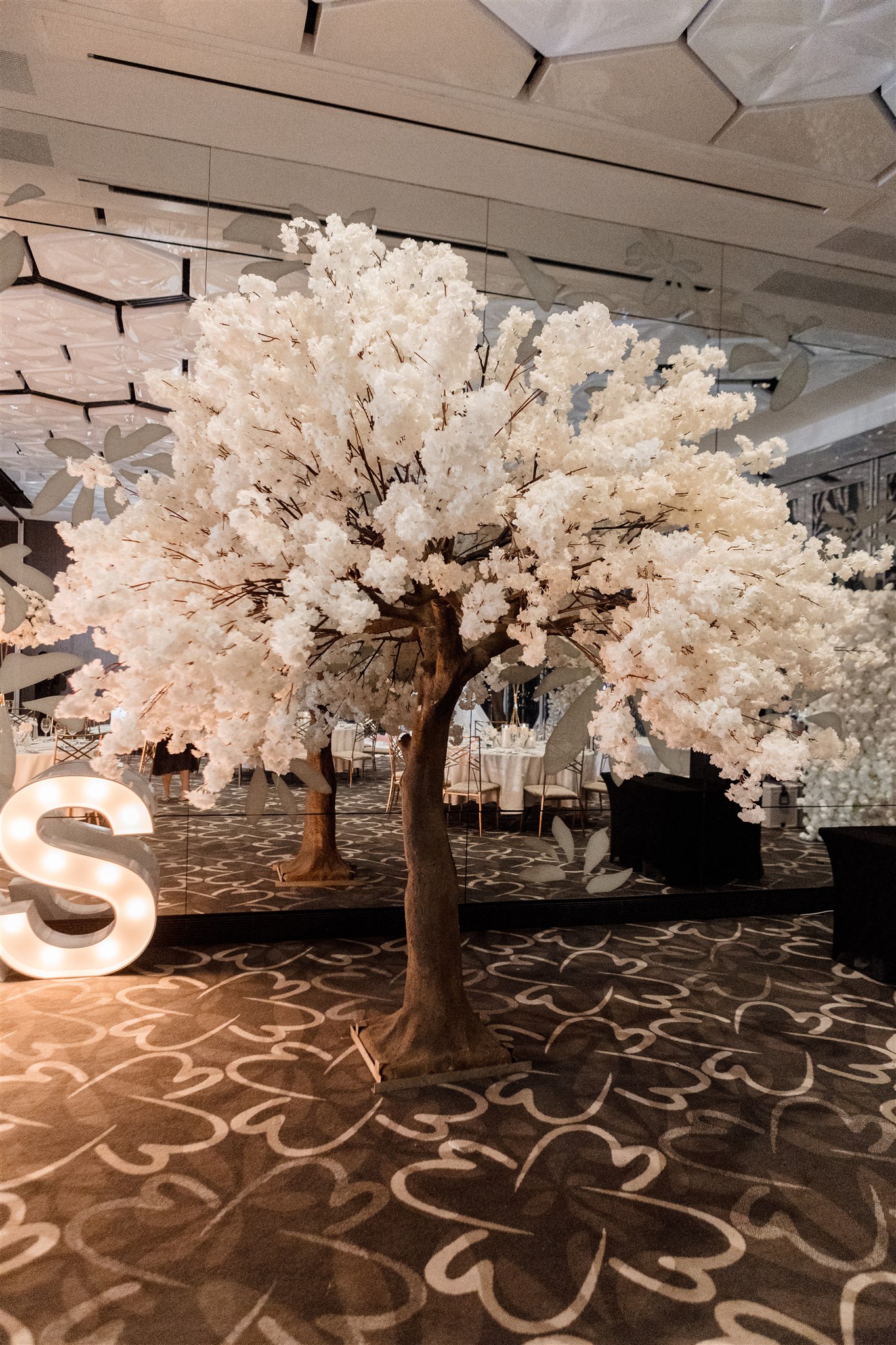 Extra large white cherry blossom tree used for wedding decoration and styling