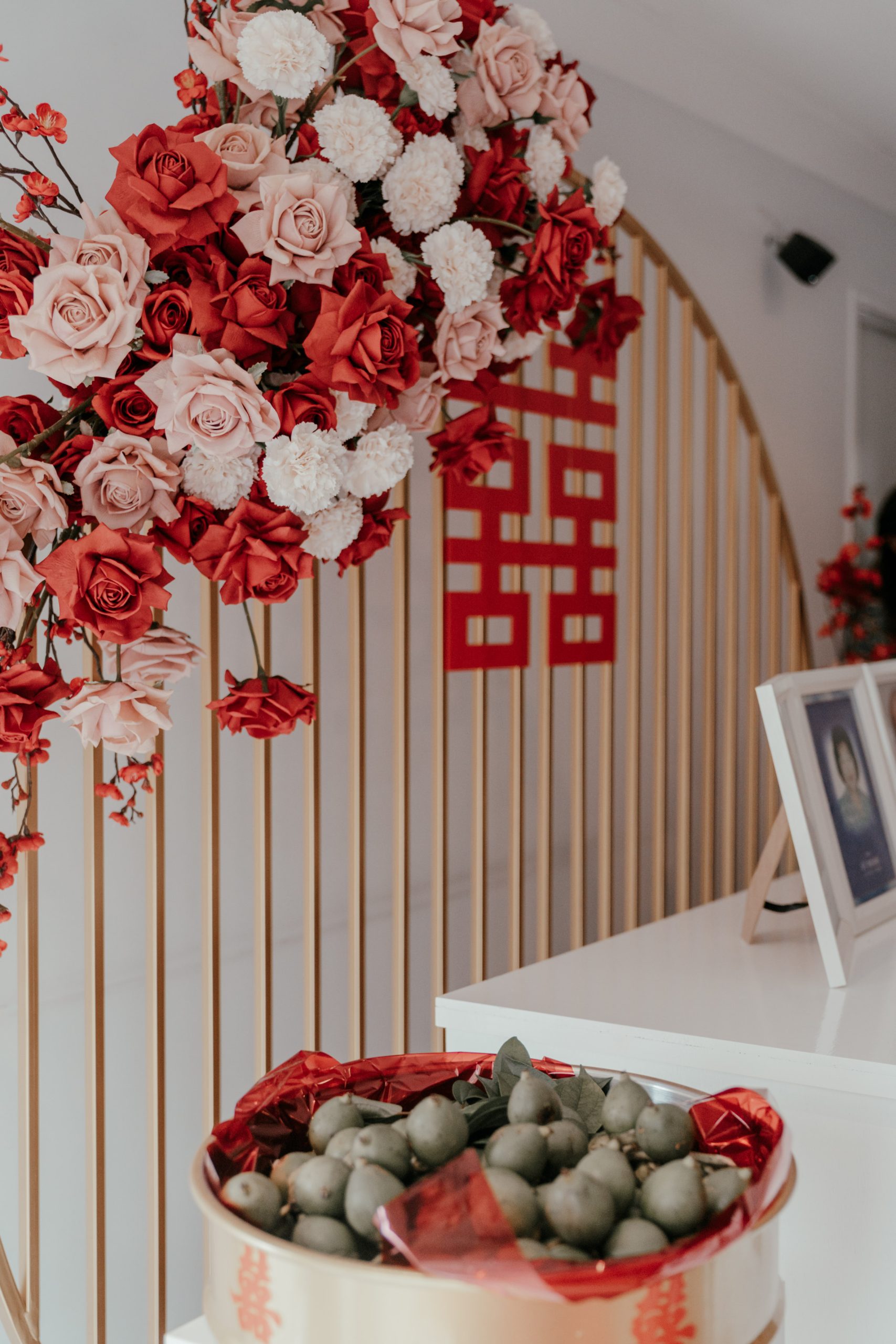 Gold detailing on oriental-themed backdrop for traditional tea ceremony.